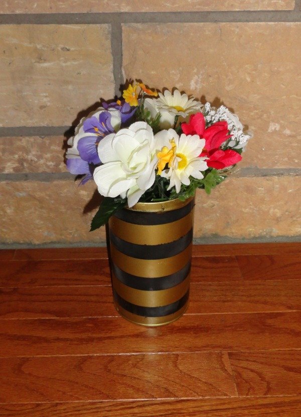 DIY striped pencil holder with flowered accents! Visit mostlymorgan.com to see how to create this!